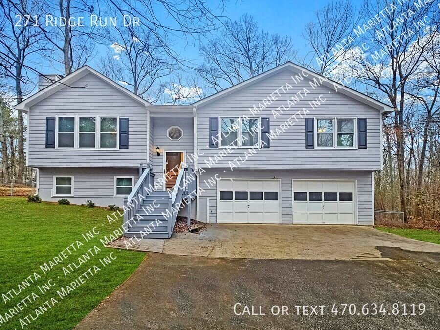 Charming 4BR/3BA Split-Level Retreat on a Secluded Wooded Lot in Hiram property image