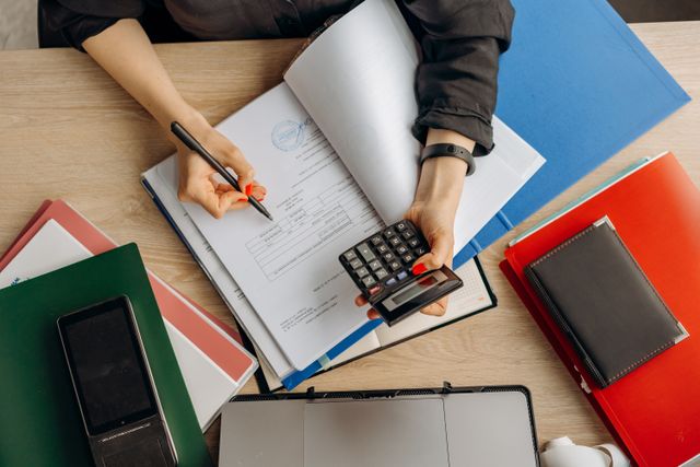 Accountant analyzing financial documents